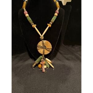 Natural bead handcrafted boho-style necklace with large pendant